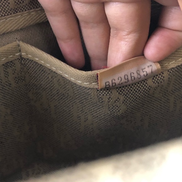 Dooney & Bourke Signature Logo Canvas/Leather Tassel Bag - Picture 11 of 16